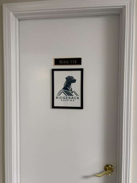 Ridgeback Roofing sign on #114 door at 2525 Moody Rd, Warner Robins, GA