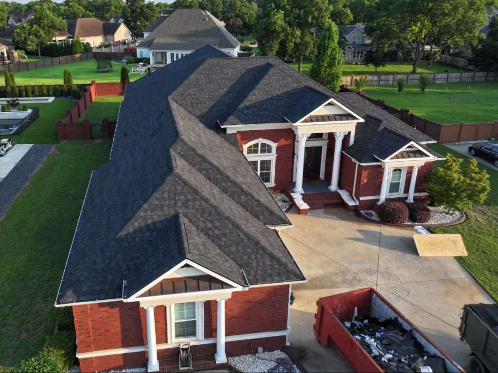 Aerial view of completed roof replacement in Warner Robins, GA by Ridgeback Roofing