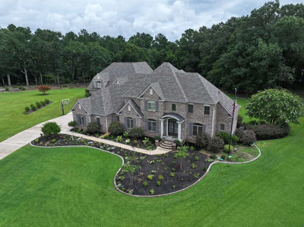 Aerial view of completed roof replacement in Warner Robins, GA by Ridgeback Roofing